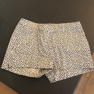 White and black print shorts